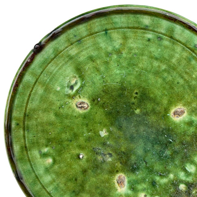 Handcrafted in southern Morocco, Tamegroute pottery is celebrated for its distinctive green glaze, organic forms, and...