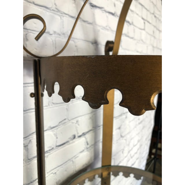 Antique Metal Display Case in Antique Gold, Round Glass Shelves and Scalloped edges. This pretty tall, round curio shelf...