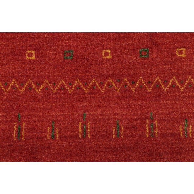 Hand-knotted in wool, this 2x3 contemporary gift-sized rug joins Rug & Kilim’s Modern collection. Featuring a rich brick...