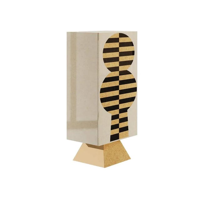 Moa Cabinet is a mid-century modern storage furniture piece distinguished by a clean silhouette. The bulky, pyramidal foot...