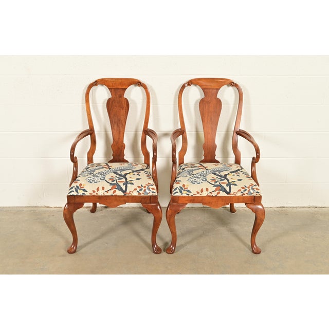 A gorgeous pair of Queen Anne or Georgian style armchairs or dining captain chairs By Baker Furniture USA, Circa 1980s...