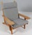 Hans j. Wegner lounge chair with loose cushions new upholstered with grey hallingdal wool from kvadrat. Frame of oak. With...