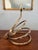 Brass spiral Slinky lamp from the 1970s in very nice condition. I was so happy to find this one of a kind lamp. It's very...