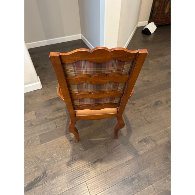 Elevate your dining experience with this stunning set of five Century Furniture “Town & Country” chairs, a masterful blend...