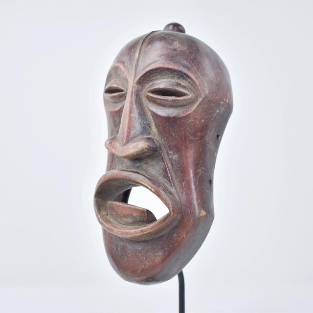 Unleash the storied beauty of Africa with the Hemba Mask from Congo. Expertly carved from wood with intricate details,...
