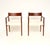A stylish and extremely well made pair of Danish vintage carver armchairs by Arne Vodder. They are the model 418a chairs,...