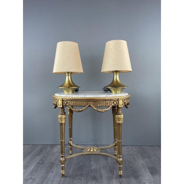 Pair of brass lamps, modernist design, circa 1970 Elegant pair of brass table lamps with a clean, minimalist design...