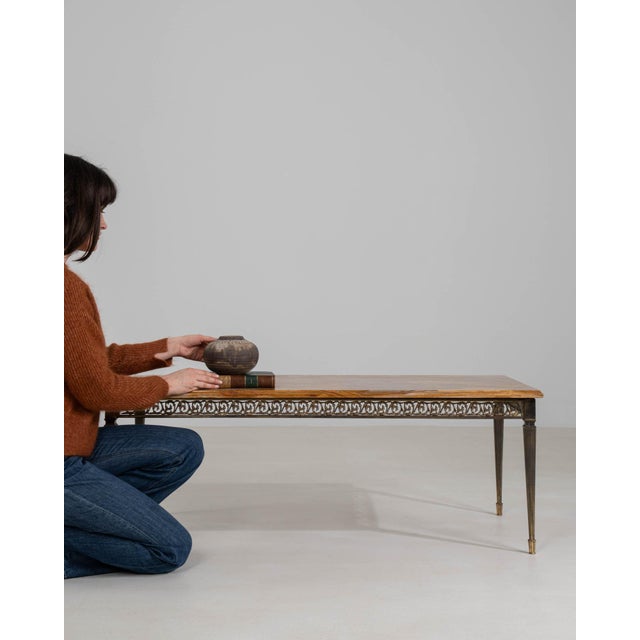 A table whose dark wood, carved openwork scroll gives it real character at first glance. It was made in France during...