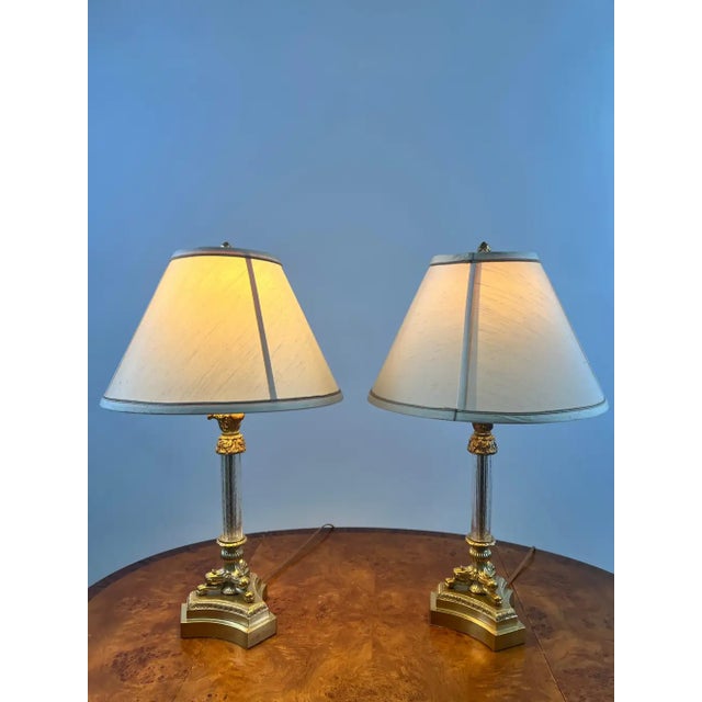 Vintage Empire Style Brass Fluted Crystal Column Table Lamp 1970's , a Pair A vintage 1070's pair of Empire-style table...
