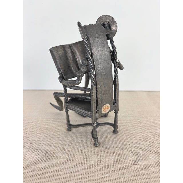 Vintage 1980s, cast pewter Sculpture of a seated Don Quixote Reading by French artist MICHEL LAUDE, also known as Michel...