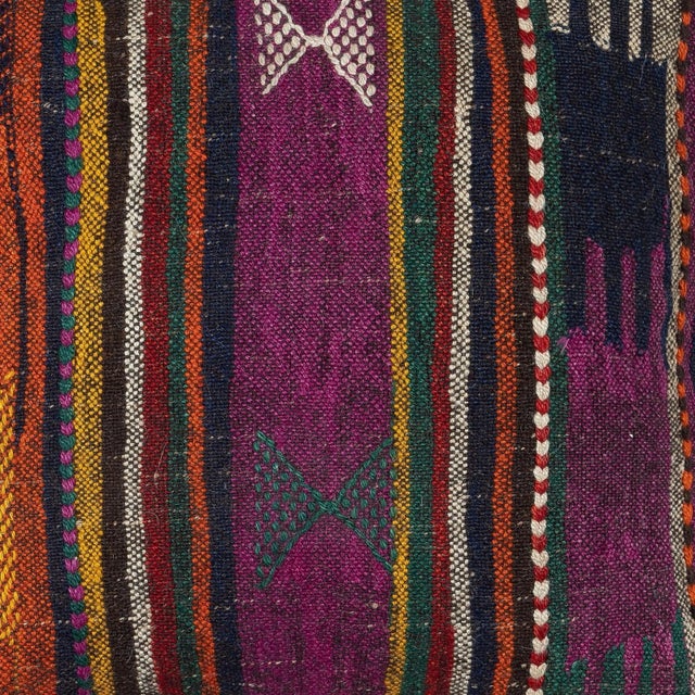 Add a touch of history and warmth to your space with this vintage handmade Turkish wool kilim cushion cover. Crafted from...