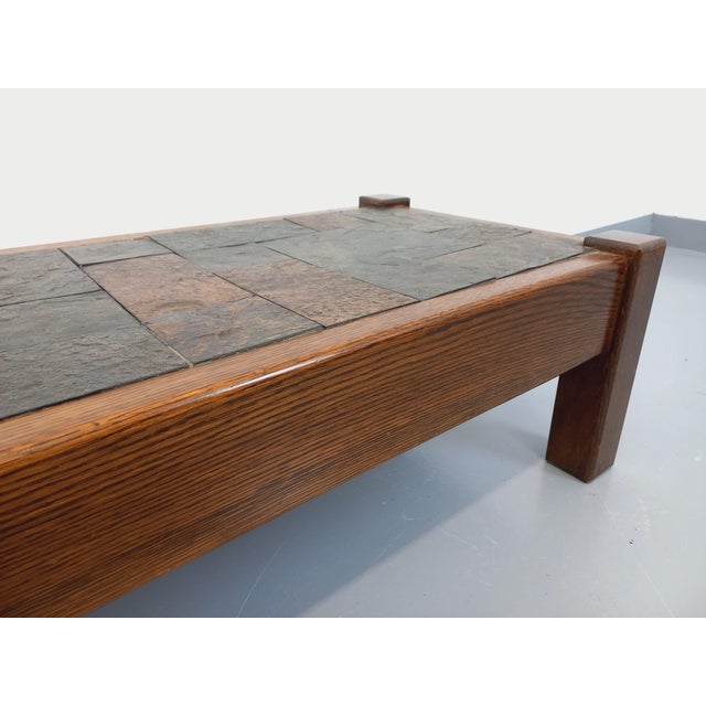 Vintage rectangular brutalist style coffee table from the 60s and 70s, base and structure in solid oak and slate top, in...
