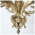 DETAILS This French, antique chandelier is crafted of heavy cast bronze with a gilt, ormolu finish. The frame is...
