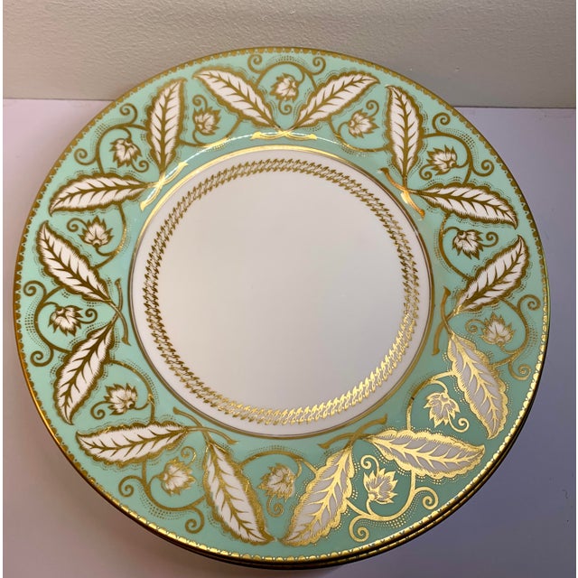 A beautiful set of 12 service, or can be used as dinner plates by Royal Worcester, fine English bone China. The rare...
