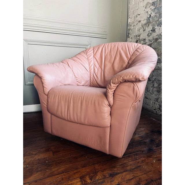 Motivated Seller! Make me an offer I can't pass up. This Pink Leather Chair features the hallmarks of Postmodern design...