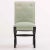 A striking set of custom-made Art Deco style dining chairs, produced in the United States during the 1990s. Commissioned...