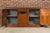 A French walnut buffet from the 19th century with two doors, a single drawer and carved foliage décor. Indulge in the...