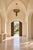 An impressive vintage Moroccan brass chandelier, handcrafted circa 1960, combining intricate pierced metalwork with a...