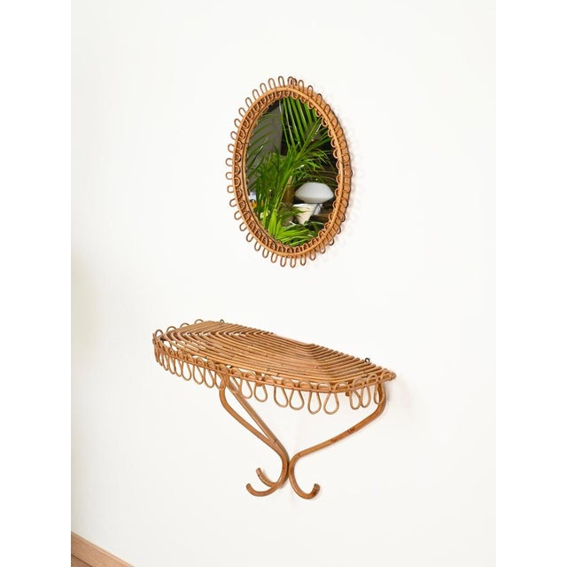 Stunning mid-century organic large rectangular wall shelf or console in curved rattan and bamboo. This stylish and unique...