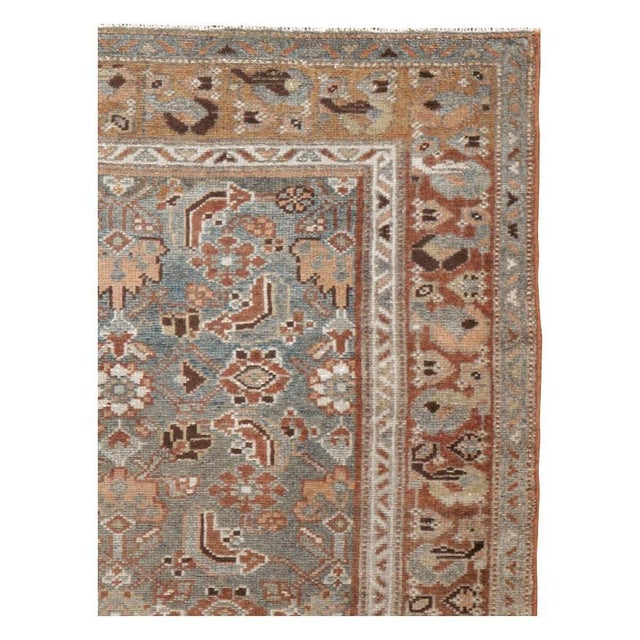 An antique Persian Malayer throw rug handmade during the early 20th century. Measures: 3' 3" x 5' 10".