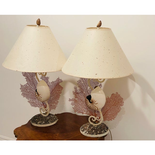 Impressive pair of vintage lamps with sea Shell nautilus and Red Sea fans. Original woven paper shades.