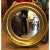Round Empire Style Gold Mirror by Randy Esada Designs. Beautiful gold gilding and beveled mirror.