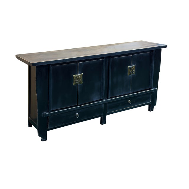 Crafted with timeless elegance, this versatile low accent cabinet features a rich dark finish enhanced by a subtle veneer...
