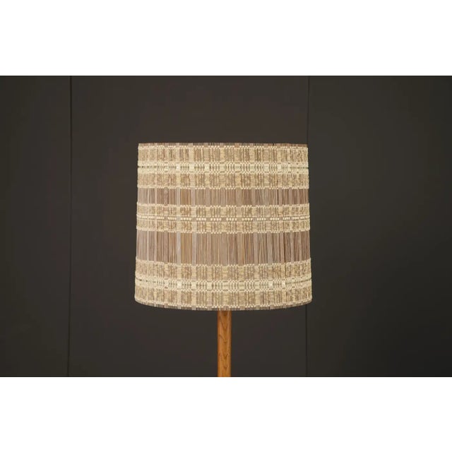A rare and striking lampshade designed by German-born, California-based textile artist Maria Kipp, celebrated for her...