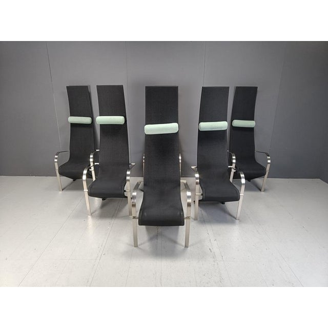 Set of six very rare and impressive high back dining room chairs manufactured by Belgochrom. The chairs consist of fine...