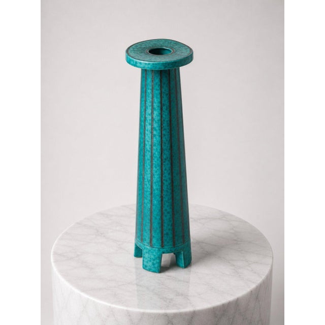 An elegant and architecturally refined Argenta vase designed by Wilhelm Kåge for Gustavsberg, Sweden, dating to the 1930s....