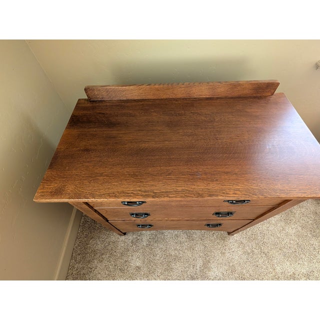The Harvey Ellis Bachelor's Chest, a cornerstone of the Mission Bedroom Collection. It features blind dovetail cross rails...