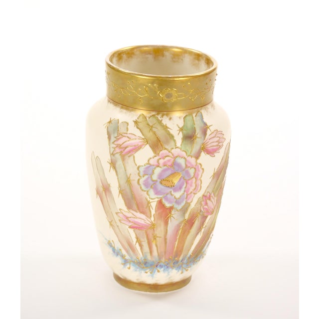 Explore the charm of this exquisite antique German porcelain decorative vase, adorned with intricate hand-painted floral...
