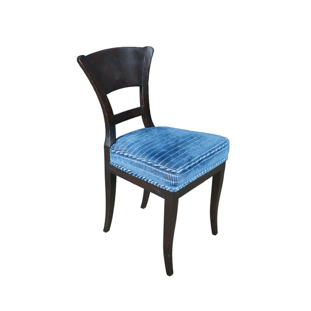 This Baker Furniture dining or side chair features a sophisticated blend of Neoclassical, Directoire and Biedermeier...