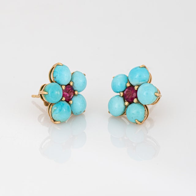 Stylish contemporary turquoise & pink tourmaline earrings crafted in 18k yellow gold. Cabochon cut turquoise measures...