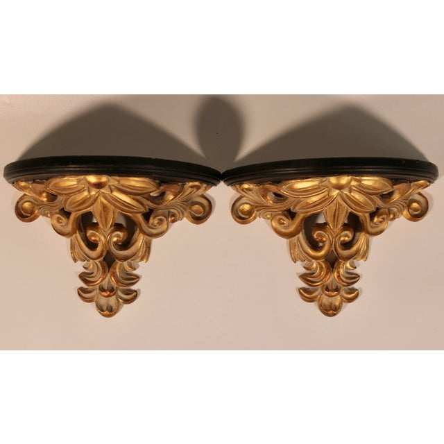 A radiant pair of beautiful Art Nouveau Wooden Wall Shelves. This is a sculptural pair with a lovely design.