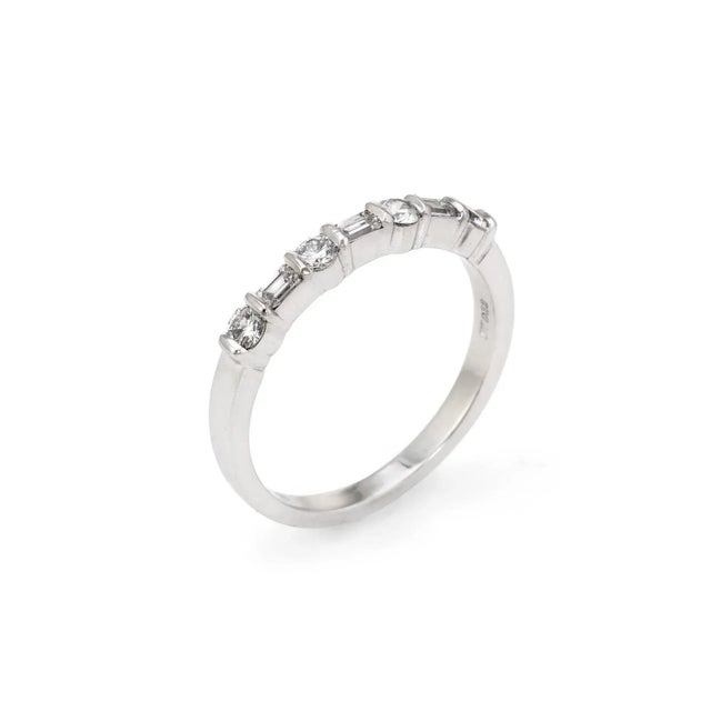 This is part of Chairish’s Fine Jewelry assortment. Pre-owned Tiffany & Co mixed cut diamond band crafted in platinum....