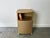 A superb vintage Lloyd Loom bedside cabinet in warm champagne gold. Woven fibre construction over a wooden frame with...