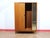 Introducing this Mid Century Modern Vintage Teak Tripple Armoire with Tambour Door by Austinsuite, a stunning addition to...