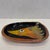 Small pottery wall plaque or catchall with bird by Martha's Vineyard potter Washington Ledesma. Signed on reverse. Two...