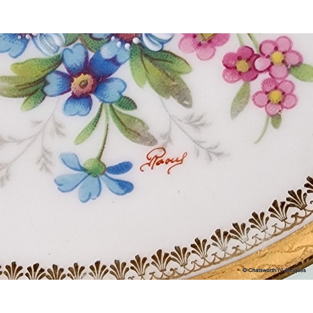 Limoges Unic Rehausse Main 11" Artist Signed Raoul Charger Plate, c1950s. Teal or seafoam colored border with gold rim and...