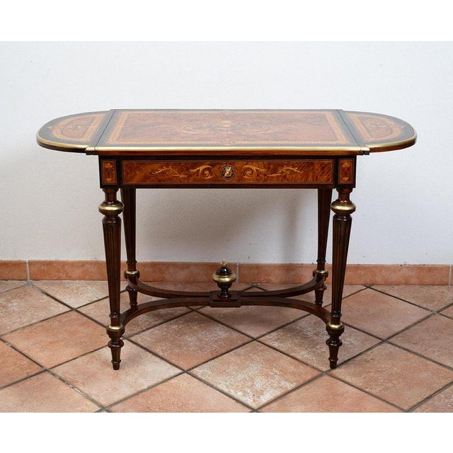 Napoleon III-style coffee table/writing desk in polychrome woods with gilded bronze accents, dating from the second half...