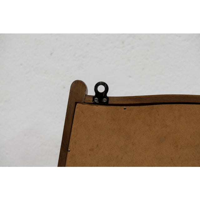 1960s Scandinavian entryway mirror with shelf. There is a stain on the shelf (visible in the photos). The mirror is very...