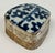 Vintage Chinese porcelain Shard box with blue and white floral pattern to top and stamped design to metal base. Age wear.