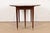 A gorgeous Federal or Regency style drop leaf dining table, breakfast table, or game table By Baker Furniture USA, Circa...