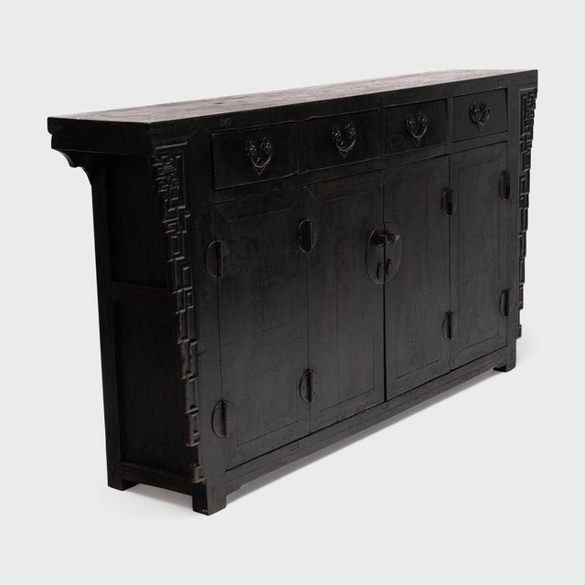 With intricate carvings and original hardware, this antique sideboard from Shanxi province is a beautiful example of...