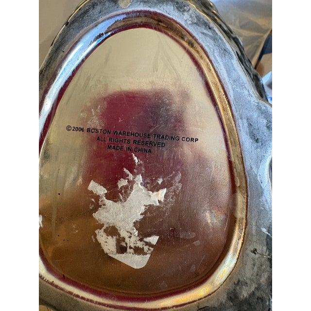 Grandmillineal heavy ceramic or stonewear. Metallic silver glaze, mirror like finish. 7” H x 5.5” length. Classic Tom...