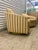 Mid-Century Modern / Hollywood Regency Low-profile barrel-back (or tub silhouette) featuring deep, integrated vertical...