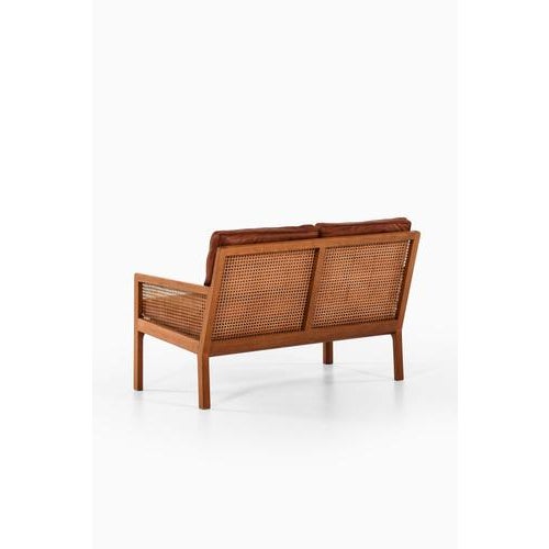Sofa in walnut, cane and original leather by bernt petersen, 1964 additional information: material: walnut, cane and...