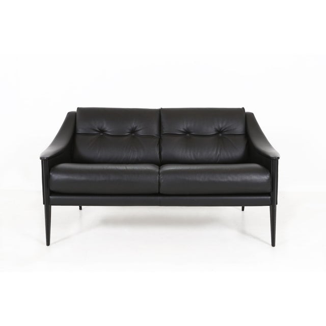 Two seat ''Dezza'' sofa by Gio Ponti Produced by Poltrona Frau. Designed in 1965, the Dezza sofa is some of Gio Ponti’s...