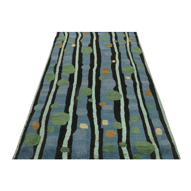 Hand-knotted in wool and sari silk, this 5x8 Scandinavian rug has been inspired from the playful retro look—has more of a...